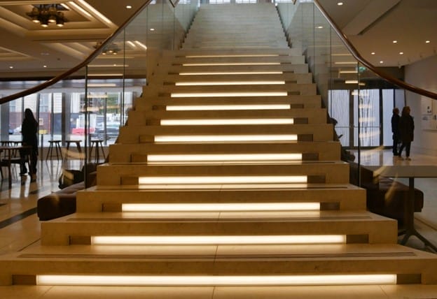 Lights installed on each step of a modern staircase.
